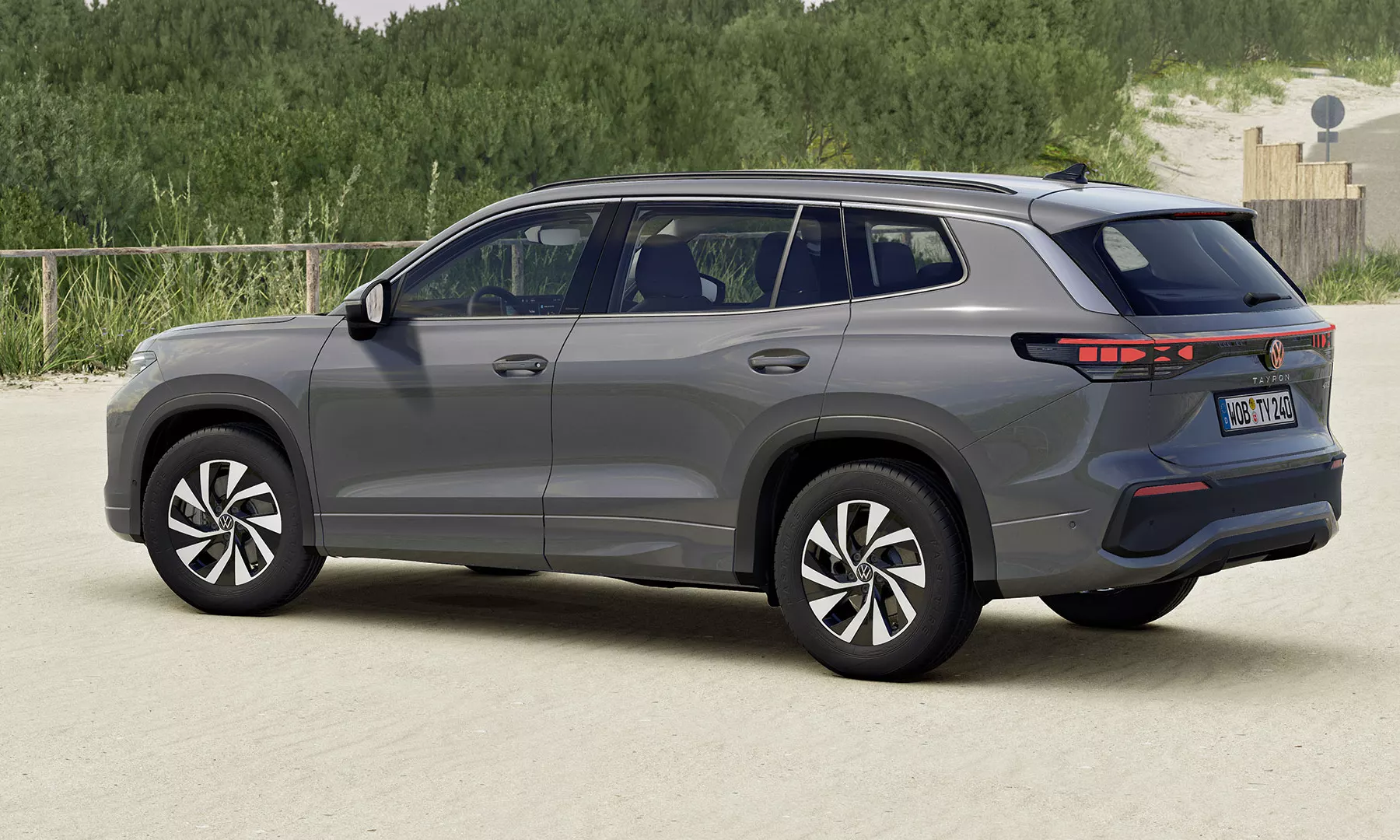 TY0116_Tayron_life_backview-in-parking-space-at-beach VW Tayron Life Heckansicht